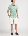 Trim-fitting short-sleeve style rendered in youthful gingham, with contrast trim on the collar and placket.Point collar Button front Contrast tab at back collarShort sleevesCottonMachine washImported