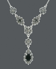 Old world glamour with modern flair. Genevieve & Grace's elegant y-shaped necklace features a filigree setting that highlights round and pear-cut onyx (3-8 mm) and sparkling marcasite. Crafted in sterling silver. Approximate length: 17 inches. Approximate drop: 1-1/2 inches. Old world glamour with modern flair. Genevieve & Grace's elegant y-shaped necklace features a filigree setting that highlights round and pear-cut onyx (3-8 mm) and sparkling marcasite. Crafted in sterling silver. Approximate length: 17 inches. Approximate drop: 1-1/2 inches.