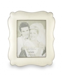 Capture your most magical moments with this large, porcelain frame. Scalloped edges and a luminous finish combine for a truly elegant effect. Qualifies for Rebate Capture your most magical moments with this large, porcelain frame. Scalloped edges and a luminous finish combine for a truly elegant effect. Qualifies for Rebate