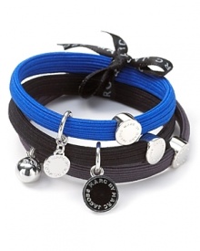 A set of three stylish hair elastics with signature MARC BY MARC JACOBS charms. A set of three stylish hair elastics with signature MARC BY MARC JACOBS charms.