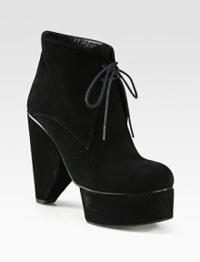 An architectural heel and island platform lift this must-have fall favorite, rendered in soft suede with wood trim. Self-covered heel, 5¼ (130mm)Covered island platform, 1¾ (45mm)Compares to a 3½ heel (90mm)Suede upper with wood trimLeather lining and solePadded insoleImported An architectural heel and island platform lift this must-have fall favorite, rendered in soft suede with wood trim. Self-covered heel, 5¼ (130mm)Covered island platform, 1¾ (45mm)Compares to a 3½ heel (90mm)Suede upper with wood trimLeather lining and solePadded insoleImported