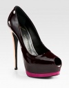 Patent leather peep toe pumps in a modern colorblock silhouette. Self-covered heel, 5½ (140mm)Covered platform, ½ (15mm)Compares to 5 heel (125mm)Patent leather upperLeather lining and solePadded insoleMade in Italy