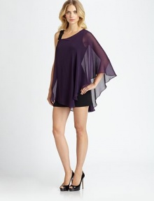 A colorful sheer overlay lends drama to this sexy design.Asymmetrical necklineShoulder strap with bow detailSheer overlay with single cape sleeveAbout 25 from natural waistOverlay: polyesterBody: rayonDry cleanImportedModel shown is 5'11 (180cm) wearing US size 4.This style runs true to size. We recommend ordering your usual size for a standard fit. A colorful sheer overlay lends drama to this sexy design.Asymmetrical necklineShoulder strap with bow detailSheer overlay with single cape sleeveAbout 25 from natural waistOverlay: polyesterBody: rayonDry cleanImportedModel shown is 5'11 (180cm) wearing US size 4.This style runs true to size. We recommend ordering your usual size for a standard fit.