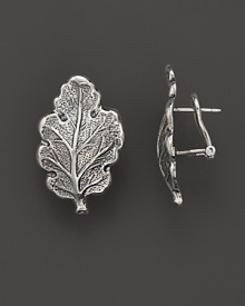 Intricately wrought sterling silver oak leaves form elegant earrings. By Buccellati.