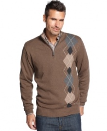 Traditional style with a hip execution, the asymmetrical argyle on this sweater from Oscar de la Renta keeps your look on point. Traditional style with a hip execution, the asymmetrical argyle on this sweater from Oscar de la Renta keeps your look on point.