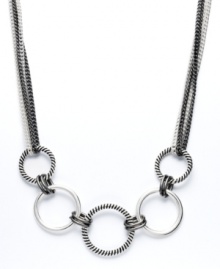 The key to good style is all in the accessories. This chic necklace by Alfani will add just the right extra touch. Interlocking circles come together in a fun frontal design. Crafted in silver tone and hematite tone mixed metal. Approximate length: 18 inches + 2-inch extender. The key to good style is all in the accessories. This chic necklace by Alfani will add just the right extra touch. Interlocking circles come together in a fun frontal design. Crafted in silver tone and hematite tone mixed metal. Approximate length: 18 inches + 2-inch extender.