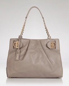 Channel this season's feminine mood with this ladylike shoulder bag from Salvatore Ferragamo. It's frame shape and gold-tone hardware makes the most sophisticated impression. Channel this season's feminine mood with this ladylike shoulder bag from Salvatore Ferragamo. It's frame shape and gold-tone hardware makes the most sophisticated impression.