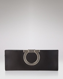 A sleek satin clutch with signature logo clip closure from Salvatore Ferragamo. A sleek satin clutch with signature logo clip closure from Salvatore Ferragamo.