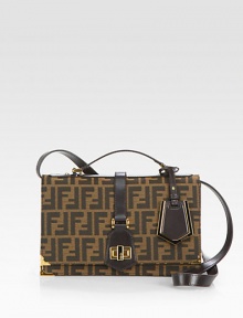 Iconic signature jacquard accented with luxuriously smooth leather trim.Leather top handle, 2 dropAdjustable leather shoulder strap, 19-22½ dropTurnlock flap closureTwo inner compartmentsOne inside zip pocketCotton lining10½W X 6½H X 5¼DMade in Italy Iconic signature jacquard accented with luxuriously smooth leather trim.Leather top handle, 2 dropAdjustable leather shoulder strap, 19-22½ dropTurnlock flap closureTwo inner compartmentsOne inside zip pocketCotton lining10½W X 6½H X 5¼DMade in Italy