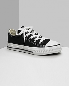 Low cut Converse All Stars. This classic canvas sneaker set the standard in cool and comfort. Available in kids sizes. With lace-up canvas uppers, contrast stitching and rubber sole and toe. Low cut Converse All Stars. This classic canvas sneaker set the standard in cool and comfort. Available in kids sizes. With lace-up canvas uppers, contrast stitching and rubber sole and toe.