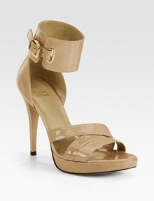 Held in place by a wide, adjustable ankle strap, this patent leather classic has criss-cross straps and an ultra-skinny heel. Self-covered heel, 3½ (90mm)Covered platform, 1 (25mm)Compares to a 2½ heel (65mm)Patent leather upperLeather lining and solePadded insoleImportedOUR FIT MODEL RECOMMENDS ordering true size. 