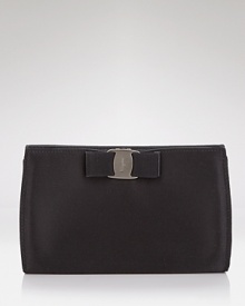 A signature grosgrain bow lends polished sophistication to Salvatore Ferragamo's satin mini bag. A signature grosgrain bow lends polished sophistication to Salvatore Ferragamo's satin mini bag.