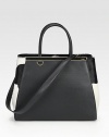 A streamlined silhouette of textured leather and luxe haircalf, features dual straps for carrying ease.Double top handles, 5½ dropRemovable shoulder strap, 13¼ dropSnap top closureProtective metal feetCenter zip compartmentTwo inside open pocketsFully lined14W X 10¾H X 6DMade in Italy