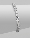 EXCLUSIVELY AT SAKS. Clear cubic zirconia stones in a classic tennis bracelet design.Cubic zirconia Rhodium plated sterling silver Length, about 7 Push lock closure Imported 