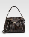 Luxurious python in a roomy carryall design, perfect for your essentials.Top handle, 6½ dropDetachable shoulder strap, 20½ dropFlip-lock flap closureProtective metal feetOne inside zip pocketTwo inside open pocketsSuede lining13W X 9H X 5¾DMade in Italy