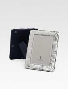 A keepsake accent for life's favorite moments and people in antiqued platinum with pleated texture and beveled glass. Arrives in a gift box Accommodates a 4 X 6 photograph Overall, 6 X 8 Imported A keepsake accent for life's favorite moments and people in antiqued platinum with pleated texture and beveled glass. Arrives in a gift box Accommodates a 4 X 6 photograph Overall, 6 X 8 Imported