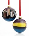 Cherish the memory of Christmas in Chicago with a glass ornament hand painted with the city's world-famous skyscrapers. Shown front and back.