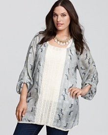 A miniature floral pattern pairs up with an eyelet insert to create this wispy-feeling Johnny Was Collection tunic. Imagine its possibilities: graceful with a slim skirt, or easygoing with jeans. A miniature floral pattern pairs up with an eyelet insert to create this wispy-feeling Johnny Was Collection tunic. Imagine its possibilities: graceful with a slim skirt, or easygoing with jeans.