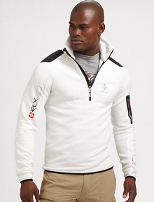 Constructed in a breathable stretch fleece, a half-zip mockneck jacket makes a sporty statement with woven patches and printed logo graphics.Half-zip frontStand collarZippered pocket at sleeve53% polyester/38% nylon/9% elastaneMachine washImported Constructed in a breathable stretch fleece, a half-zip mockneck jacket makes a sporty statement with woven patches and printed logo graphics.Half-zip frontStand collarZippered pocket at sleeve53% polyester/38% nylon/9% elastaneMachine washImported
