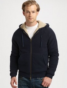 The ultimate in winter warmth and style marries the easy comfort of a cozy, lined cotton knit hoodie.Two-way zip frontAttached drawstring hoodKangaroo pocketsLining: polyesterCottonMachine washImportedAdditional Information Men's Shirts & Sweaters Size Guide The ultimate in winter warmth and style marries the easy comfort of a cozy, lined cotton knit hoodie.Two-way zip frontAttached drawstring hoodKangaroo pocketsLining: polyesterCottonMachine washImportedAdditional Information Men's Shirts & Sweaters Size Guide