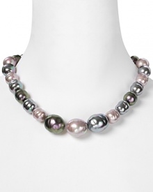 Add instant polish with this graduated, tonal pearl necklace from Majorica. A truly eye-catching style, this piece adds impact to any basic neckline. Add instant polish with this graduated, tonal pearl necklace from Majorica. A truly eye-catching style, this piece adds impact to any basic neckline.