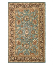 A choice color blue behind a myriad of intricate and vibrant floral medallions creates a simply elegant and rich Persian-inspired rug from Safavieh. Hand-tufted and woven from pure wool by experienced artisans in India, it makes a refined statement wherever placed. (Clearance) A choice color blue behind a myriad of intricate and vibrant floral medallions creates a simply elegant and rich Persian-inspired rug from Safavieh. Hand-tufted and woven from pure wool by experienced artisans in India, it makes a refined statement wherever placed. (Clearance)