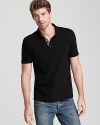 Classic fit polo in soft cotton, accented with contrast placket lining.