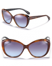 Retro-inspired frames meet modern colored lenses for a fun, chic look from MARC BY MARC JACOBS. Retro-inspired frames meet modern colored lenses for a fun, chic look from MARC BY MARC JACOBS.