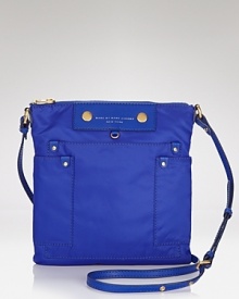 Make like a schoolgirl and grab MARC BY MARC JACOBS' nylon crossbody. The smart bag aces style standards with a blazer and plaid minis. Make like a schoolgirl and grab MARC BY MARC JACOBS' nylon crossbody. The smart bag aces style standards with a blazer and plaid minis.