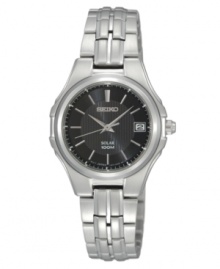 Classic precision and solar power technology give this Seiko watch endless appeal. Crafted of stainless steel bracelet and round case. Black patterned dial features silver-tone three hands, applied stick indices at markers, minute track, date window at three o'clock and logo at twelve o'clock. Solar-powered quartz movement. Water resistant to 100 meters. Three-year limited warranty. Classic precision and solar power technology give this Seiko watch endless appeal. Crafted of stainless steel bracelet and round case. Black patterned dial features silver-tone three hands, applied stick indices at markers, minute track, date window at three o'clock and logo at twelve o'clock. Solar-powered quartz movement. Water resistant to 100 meters. Three-year limited warranty.