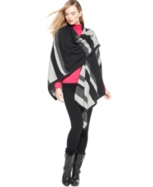 Get wrapped up in the colorblock craze with this cool, contemporary design from Calvin Klein. Luxurious and lovely, it's the perfect way to keep cozy when the chill sets in. Get wrapped up in the colorblock craze with this cool, contemporary design from Calvin Klein. Luxurious and lovely, it's the perfect way to keep cozy when the chill sets in.