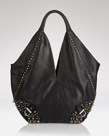 Embrace a downtown edge with this street-chic tote tote from Sam Edelman. It features a luxuriously slouchy shape and hard-hitting details. Embrace a downtown edge with this street-chic tote tote from Sam Edelman. It features a luxuriously slouchy shape and hard-hitting details.