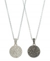 Mix and match to fit your many moods. This sparkling Judith Jack necklace features a reversible circular pendant decorated with marcasite on one side and crystal on the reverse side. Setting and chain crafted in sterling silver. Approximate length: 16 inches. Approximate drop: 1-1/4 inches.