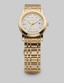 An iconic check patterns brushed yellow gold IP over stainless steel in a charming style worn elegant time and time again. Analog movement Water resistant up to 5 ATM Round case, 28mm, 1.10 IP yellow gold over stainless steel White dial with haymarket check engraved pattern Day/date display Second hand Markers Bracelet width, 28mm, 1.10 Made in Switzerland An iconic check patterns brushed yellow gold IP over stainless steel in a charming style worn elegant time and time again. Analog movement Water resistant up to 5 ATM Round case, 28mm, 1.10 IP yellow gold over stainless steel White dial with haymarket check engraved pattern Day/date display Second hand Markers Bracelet width, 28mm, 1.10 Made in Switzerland