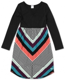 With a hi-low cut and spectacular stripes, this Roxy dress will make your little lady feel all grown up. With a hi-low cut and spectacular stripes, this Roxy dress will make your little lady feel all grown up.