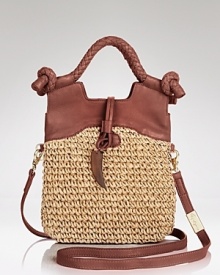 Foley + Corinna take its signature mini tote on vacation with straw and tawny leather trims. No time to relax: this bag hits the beach then tucks under your arm as a clutch. Foley + Corinna take its signature mini tote on vacation with straw and tawny leather trims. No time to relax: this bag hits the beach then tucks under your arm as a clutch.