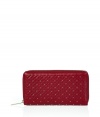 Ultra-chic with an edgy twist, this supple leather wallet from Valentino boasts a stylish sprinkle of studded embellishment - Classic rectangle shape, top zip closure, multiple pockets from credit cards, IDs, and bills, all-over stud detail - Perfect for daily use or as a thoughtful gift