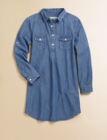 A go-with-anything wardrobe essential, the denim chambray shirt dress is classic and cool with signature embroidery in a snap-front design.Shirt collarLong sleeves with roll-tab snap cuffsSnap-frontFront snap-flap pocketsBack yokeShirttail hemCottonMachine washImported Please note: Number of snaps may vary depending on size ordered. A go-with-anything wardrobe essential, the denim chambray shirt dress is classic and cool with signature embroidery in a snap-front design.Shirt collarLong sleeves with roll-tab snap cuffsSnap-frontFront snap-flap pocketsBack yokeShirttail hemCottonMachine washImported Please note: Number of snaps may vary depending on size ordered.