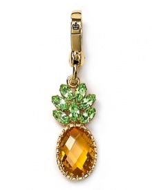 Charm them. Juicy Couture's tropical token is destined to be the pineapple of a glamour girl's eye.