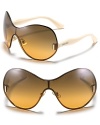 Miu Miu's shield sunglasses with a sleek and curvy silhouette and glittery arms are sure to turn heads.