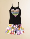 Her heart will skip a pretty beat when she sets her sights on this striking ruffled frock adorned with sequins and a watercolor print.ScoopneckSpaghetti strapsPullover styleDrawstring waistbandRuffled hemRayonHand washImported