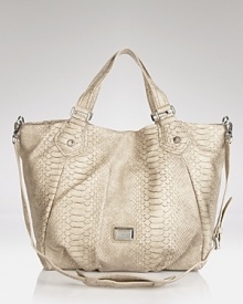 Make an exotic your new signature with this printed and snake embossed tote from MARC BY MARC JACOBS. Spacious enough to stow the essentials, it tips the scales. Make an exotic your new signature with this printed and snake embossed tote from MARC BY MARC JACOBS. Spacious enough to stow the essentials, it tips the scales.