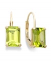Pear perfection. Add a vibrant pop of color to your look with peridot-cut garnet (3/4 ct. t.w.) set in luminous 14k gold. Approximate drop: 1/2 inch.
