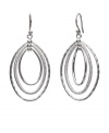 Add simple, chic style in an instant. These versatile drops by Monet feature three graduated ovals in polished and textured silver tone mixed metal. Approximate drop: 2-1/2 inches.