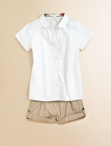A pretty, crisp cotton blouse in a clean silhouette with classic check trim.Peter Pan collarShort sleevesButton frontCheck trim inside neckCottonMachine washImported Please note: Number of buttons/snaps may vary depending on size ordered. A pretty, crisp cotton blouse in a clean silhouette with classic check trim.Peter Pan collarShort sleevesButton frontCheck trim inside neckCottonMachine washImported Please note: Number of buttons/snaps may vary depending on size ordered.