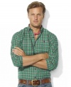 A handsome sport shirt is rendered in woven cotton with a preppy plaid pattern and relaxed fit for classic style.