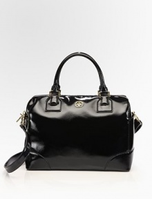A polished classic, this structured patent leather style boasts clean lines, goldtone hardware and dual straps for versatility.Double top handles, 5 dropRemovable adjustable shoulder strap, 9½-21½ dropTop zip closureProtective metal feetOne inside zip pocketTwo inside open pocketsOne inside mirrorCanvas lining13W X 9H X 7DImported A polished classic, this structured patent leather style boasts clean lines, goldtone hardware and dual straps for versatility.Double top handles, 5 dropRemovable adjustable shoulder strap, 9½-21½ dropTop zip closureProtective metal feetOne inside zip pocketTwo inside open pocketsOne inside mirrorCanvas lining13W X 9H X 7DImported