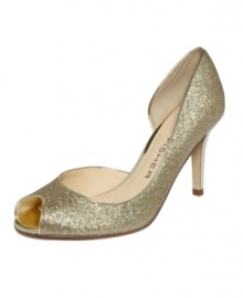 All that glitters. The Joey peep-toe pumps by Marc Fisher sparkle with a glittery finish upper and stiletto heel. For a dressy formal event or a fun night on the town, they'll be sure to get plenty of attention!