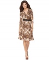 It's a wrap! Jones New York's petite printed dress really highlights your figure with side ruching and a belted waist.