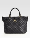 An incredibly roomy silhouette crafted from soft quilted leather, finished with a chunky chain and leather shoulder strap for a signature touch.Double top handles, 5 dropRemovable shoulder strap, 12½ dropTop zip closureOne inside open pocketLinen lining12½W X 11H X 4½DMade in Italy